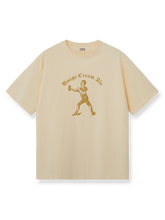 DRINKING TEAMロゴのジンジャーイエロー×アイボリー配色ヴィンテージTシャツ。