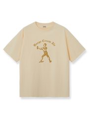 DRINKING TEAMロゴのジンジャーイエロー×アイボリー配色ヴィンテージTシャツ。