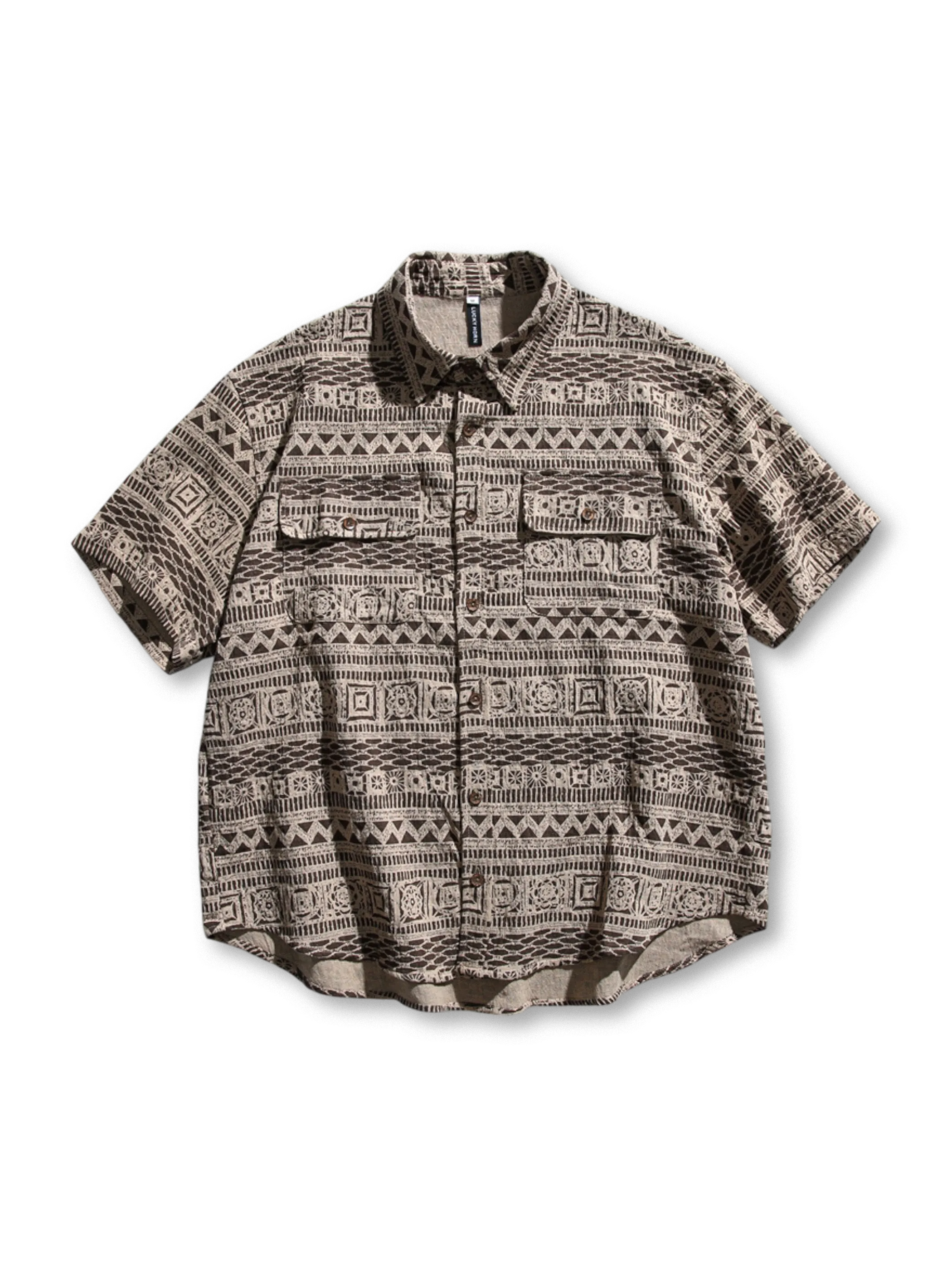 エスニック柄ブロックプリントと実用的ポケットが特徴のワークシャツ