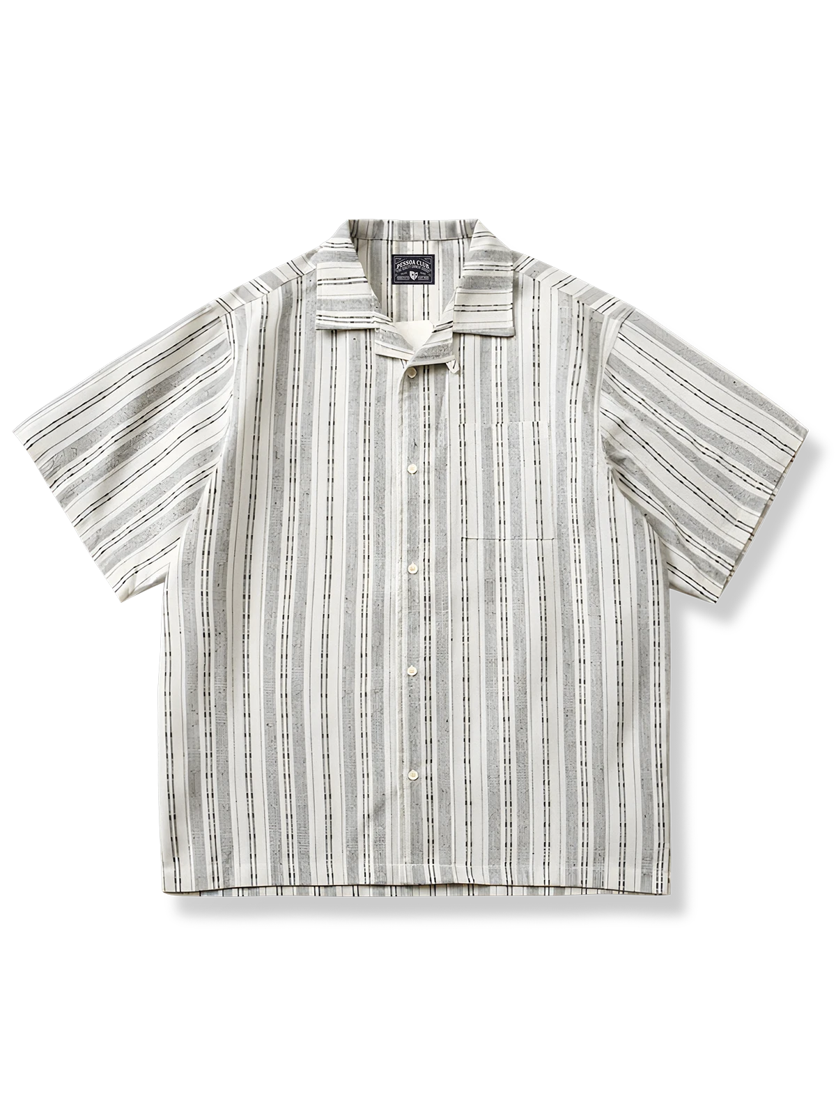 エスニックストライプの綿麻キューバカラーシャツ。