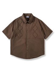 花柄パイピング工芸が施されたコットン半袖シャツ