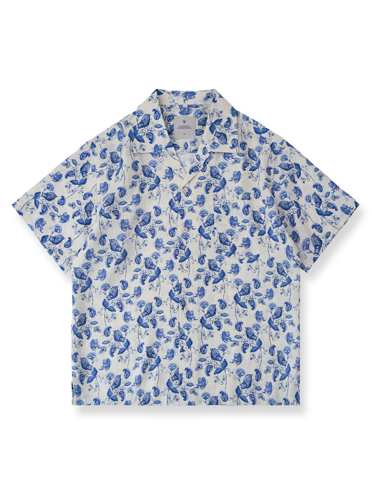 花柄と蝶の水彩プリントが映えるリネン製キューバカラーシャツ。