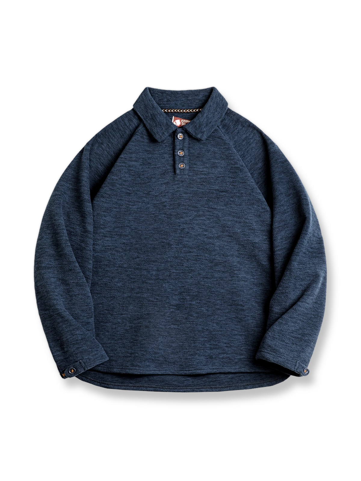 ブルーグレーのネップフリース素材とハーフジップが特徴のルーズフィットスウェット。