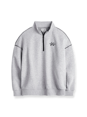 霜降り中空構造素材を使ったハーフジップスタンドカラーのルーズフィットスウェット