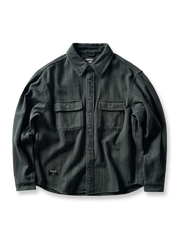 ウォッシュ加工が施されたヴィンテージ感あふれるヘビーフランネルストライプ長袖シャツの正面画像、胸元のダブルポケットと金属ボタンのディテール。