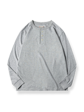 厚手コットンのルーズフィット長袖ヘンリーTシャツ