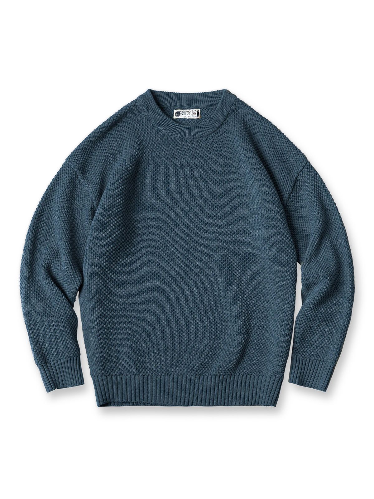 パイナップルステッチとリブ仕上げが特徴のヘビーウェイトパイル編みセーター