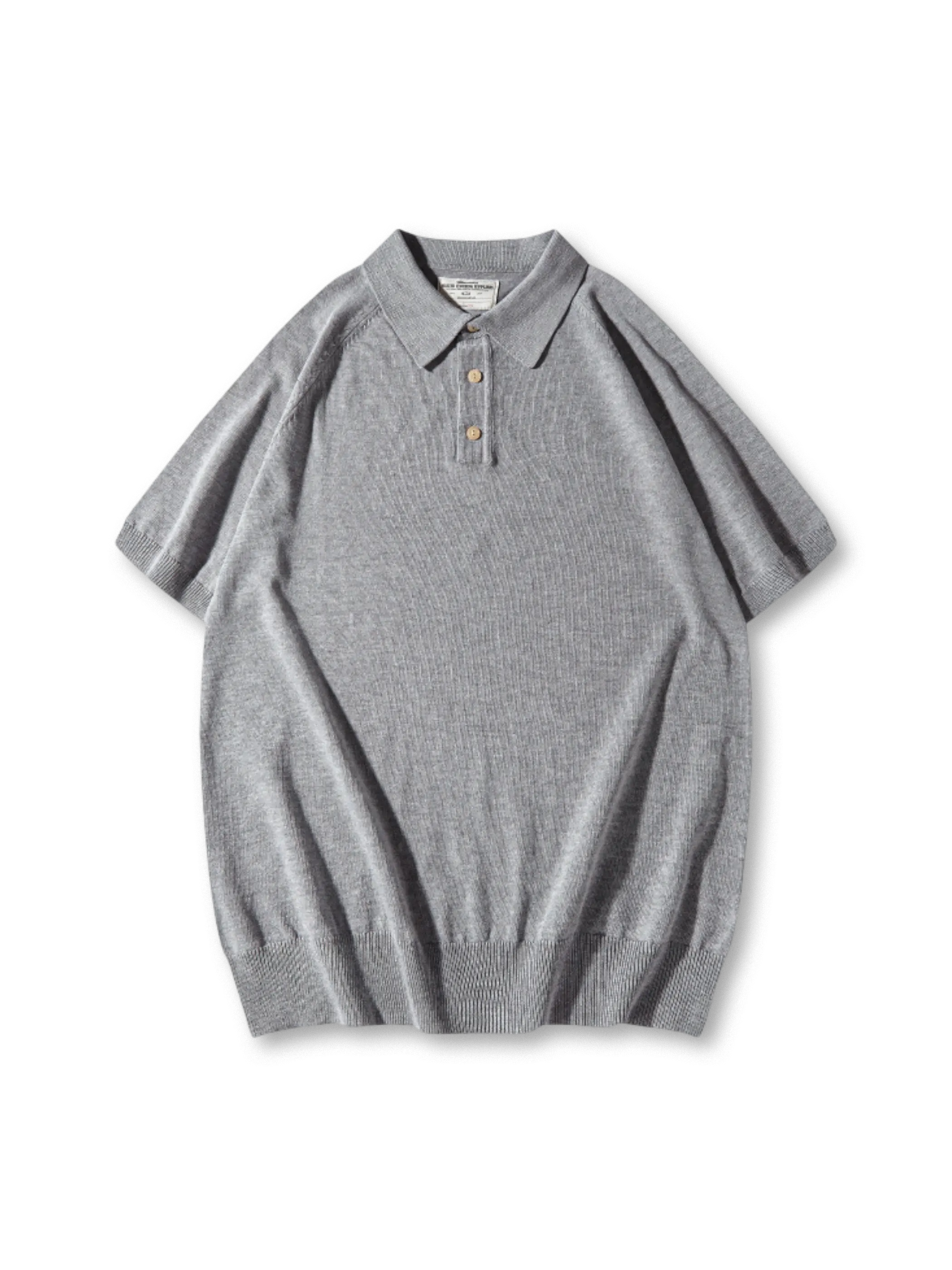 高密度コットンチェック生地とラグランスリーブが特徴の上品なオーバーシャツ