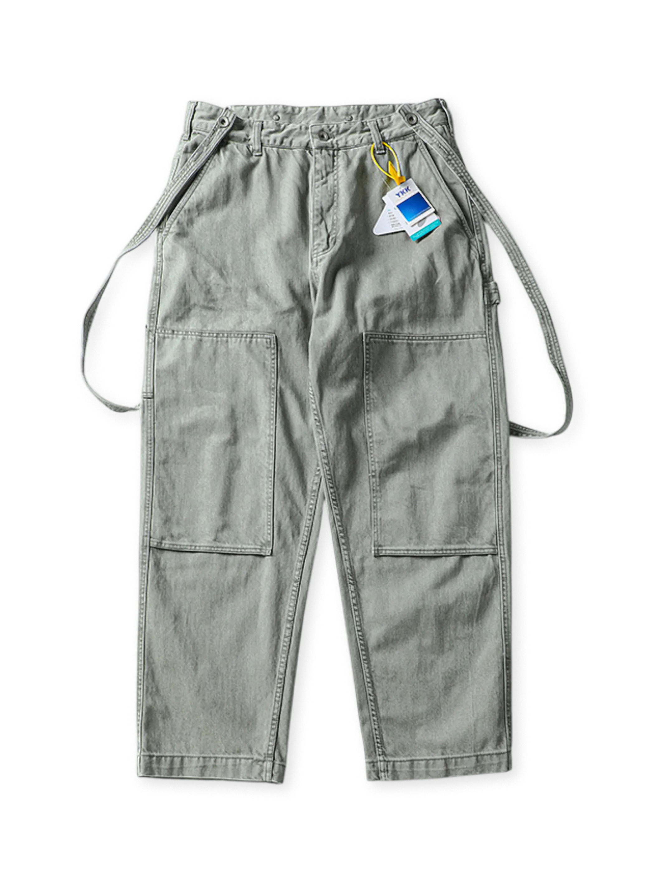 耐久性の高い高密度ヘヴィーコットンを使用し、サスペンダーデザインと多ポケットが特徴の伐採風ワークパンツ。4色展開。
