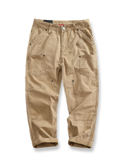 魚骨模様パッチワークとヴィンテージ加工が特徴の改良型ワークパンツ