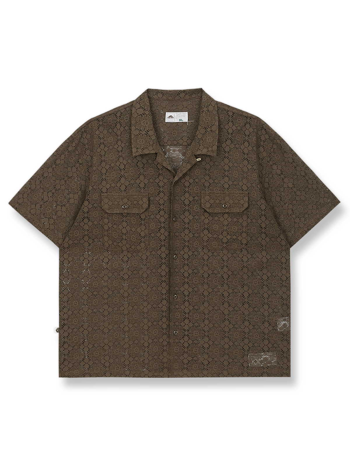 レース刺繍が施されたコットンニットシャツ。
