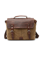 牛革とキャンバスを組み合わせたメッセンジャーバッグ、真鍮金具と多ポケット付き。