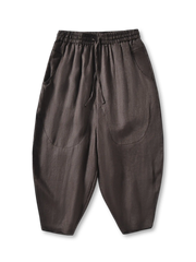 薄手リネン素材のドロップクロッチイージーパンツ、ゴム&ドローコードウエストと機能的なサイドポケット付き