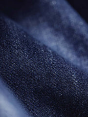 製品画像: M51デニムフィッシュテール パーカ(フード付き)の全体像を正面から撮影した画像
詳細画像: 青銅色のジッパーとフィッシュテールデザインを強調したディテール画像