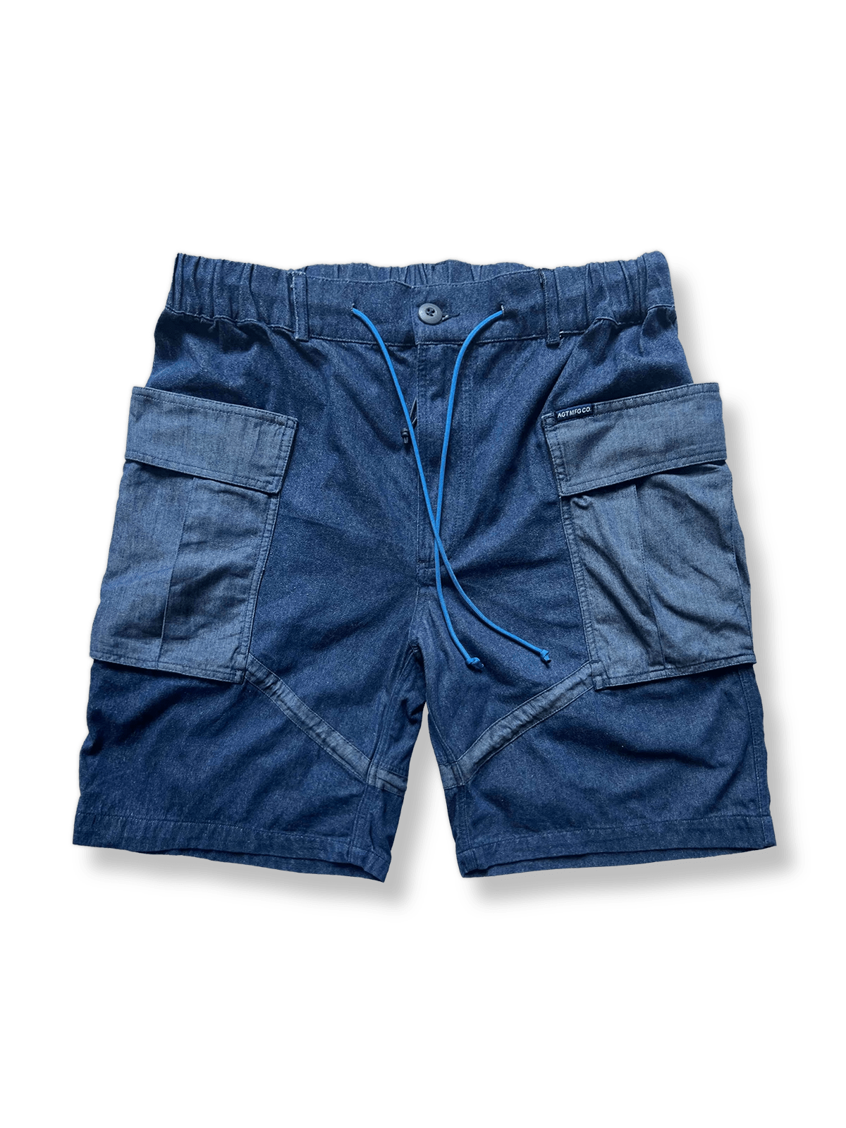 メッシュナイロン素材のM65ワークショーツ。通気性と耐久性を両立し、ダブルレイヤーポケットと脚部ストラップで機能性を高めた五分丈ショーツ。