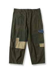 異素材パッチワークとワイドシルエットが特徴の日本製カジュアルパンツ。YKKジッパーと高品質メタルボタン付き。