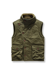 シープスキン風裏地付きのN1デッキベスト。耐久性あるコットン素材と多ポケット仕様が特徴。