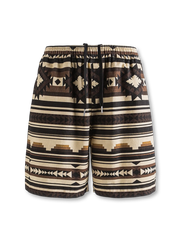 ナバホ族の幾何学柄をプリントし、通気性とリラックスした着心地が特徴のコットンショーツ。