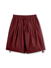 ナバホ刺繍が映える深海ブルーのドローストリングショーツ