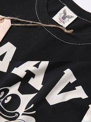 Tシャツのフィリックス・ザ・キャット(Felix the Cat)プリントとNAVY 87A FOOTBALLの文字の特写画像