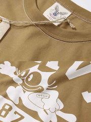 Tシャツのフィリックス・ザ・キャット(Felix the Cat)プリントとNAVY 87A FOOTBALLの文字の特写画像