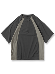 速乾素材とジップスタンドカラーを備えたアウトドアポロシャツ。