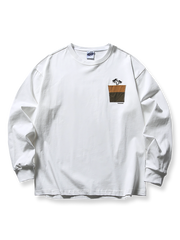 胸元にヤシの木刺繍が施された280gコットンの長袖Tシャツ。柔らかく通気性に優れたルーズフィットシルエット。