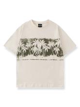 ヤシの木プリントのオーバーサイズ半袖Tシャツの前面が見える商品画像
