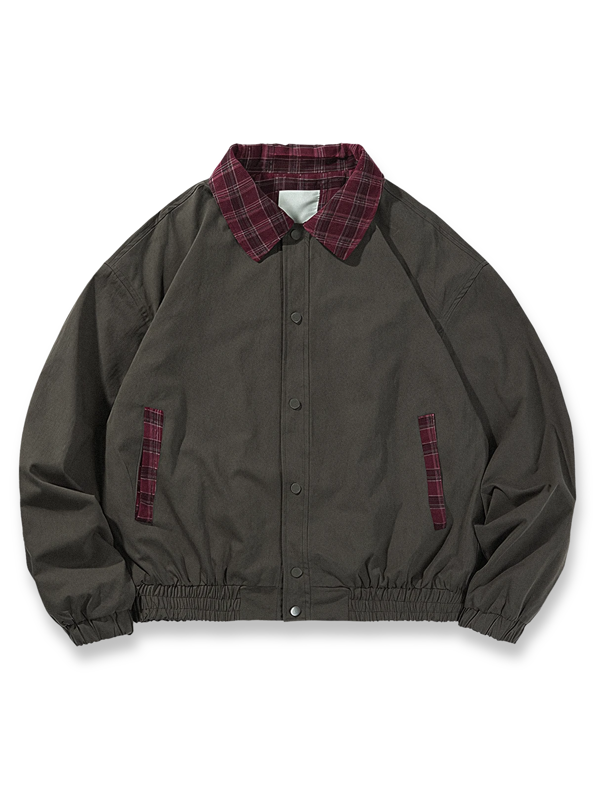 レトロなチェック柄パッチワークとルーズフィットのクラシックコットンジャケット。裾ゴムで快適な着用感。