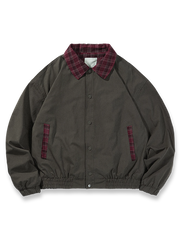 レトロなチェック柄パッチワークとルーズフィットのクラシックコットンジャケット。裾ゴムで快適な着用感。