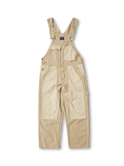 パッチワークポケットとヘビーツイル生地が特徴のワークオーバーオール