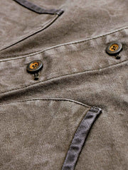 製品画像: アメカジヴィンテージ農場主スタイルのオープンカラーコットンキャンバスワークジャケットの全体像
詳細画像: アンティーク調真鍮メタルボタンと独特なウォッシュ加工のディテール