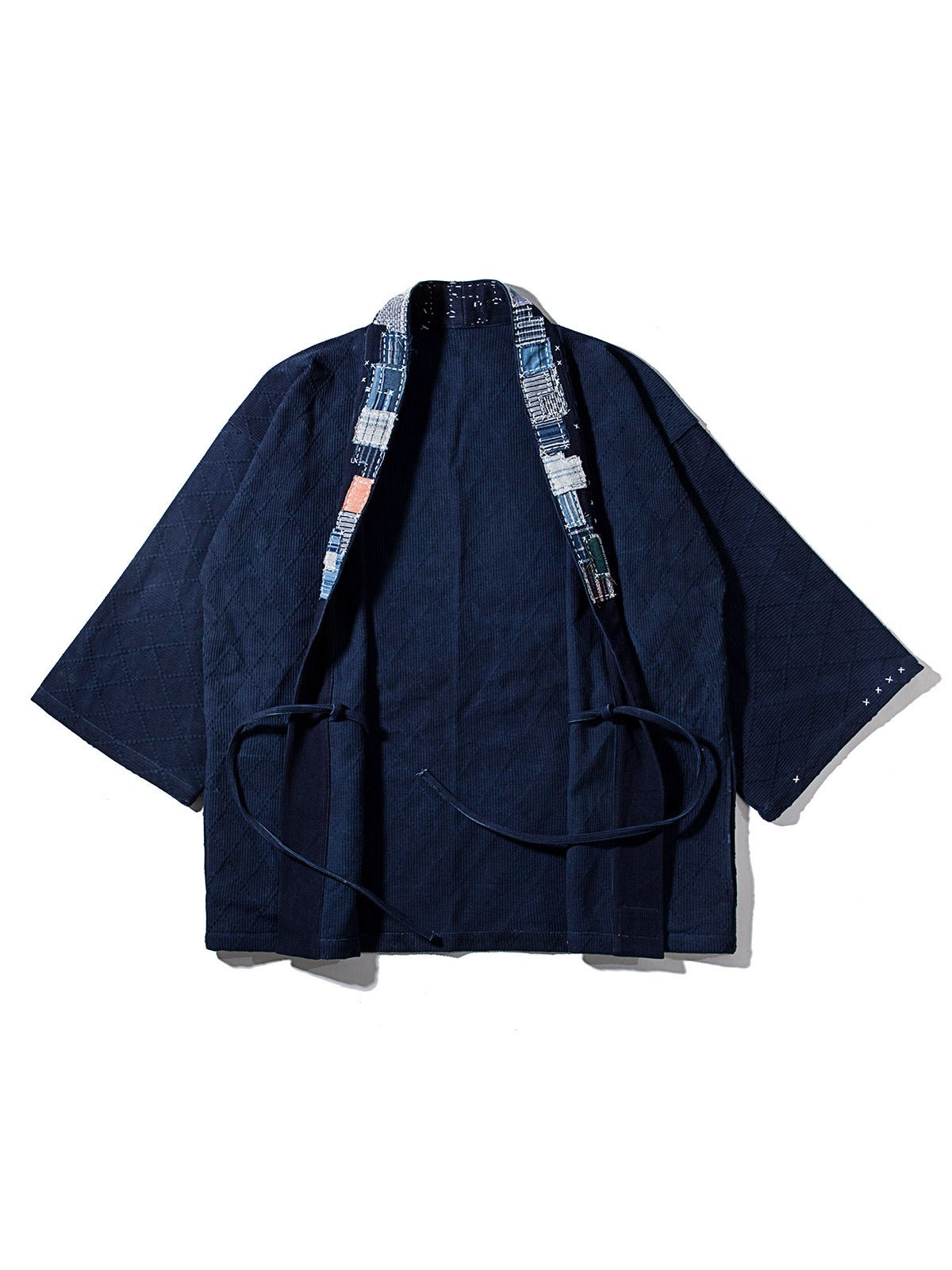 製品画像:植物染め剣道着生地手織り布刺し子パッチワーク七分袖前開きシャツの正面画像
詳細画像:刺し子のパッチワークと手作業による染めのディテール画像