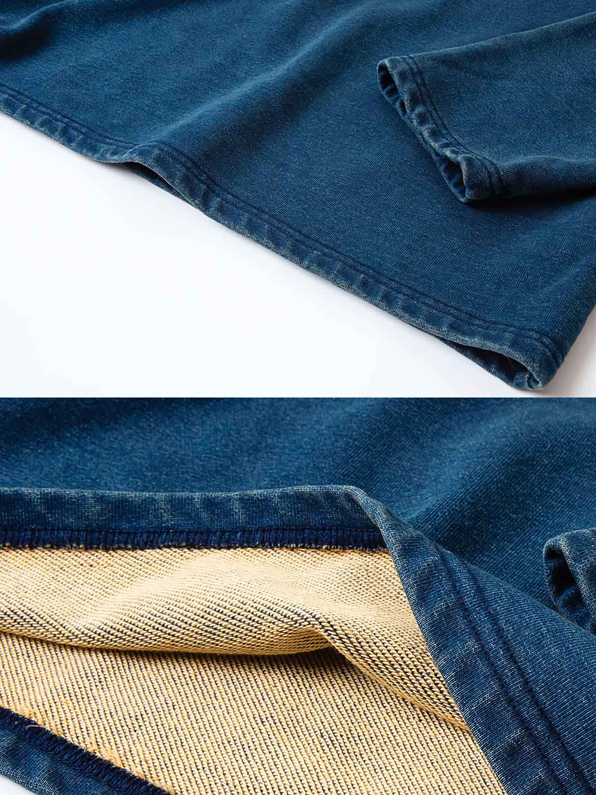 刺繍されたスマイリーフラワーとパッチワークのディテール