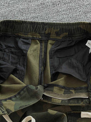 ワークパンツのサイドポケットとウエストゴム、ドローストリングデザインのディテール図