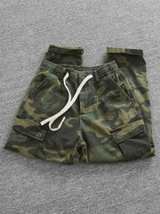 ワークパンツのサイドポケットとウエストゴム、ドローストリングデザインのディテール図