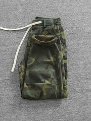 ワークパンツのサイドポケットとウエストゴム、ドローストリングデザインのディテール図