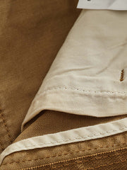 パッチワーク裁断とリベットディテールのクローズアップ