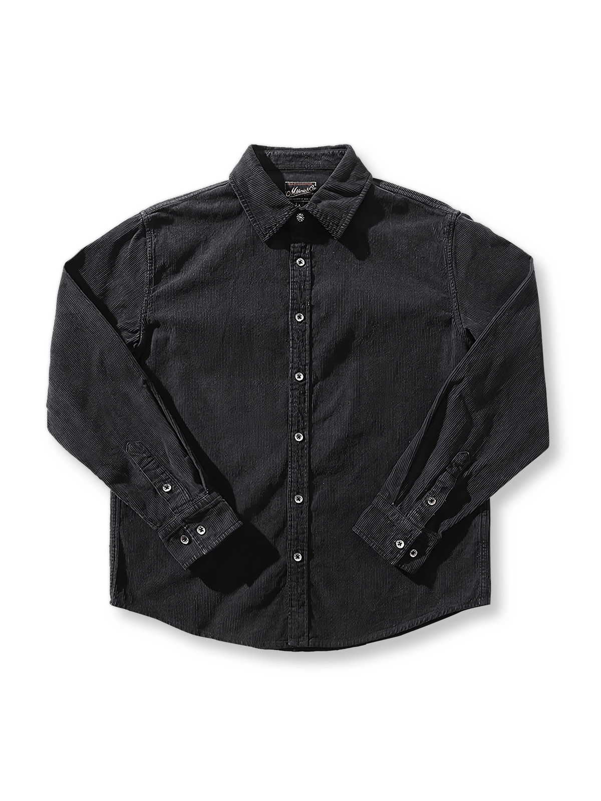 製品画像: ヘビーコーデュロイシャツの正面展示
詳細画像: ラウンドヘムとヴィンテージ風ボタンのディテールクローズアップ