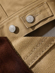 製品画像: オイルワックスジュファブリックのアメリカンビンテージライダースジャケット平置き画像 - 防風・保温デザイン
詳細画像: ヴィンテージ刺繍とコーデュロイ襟のディテール - レイヤー感とヴィンテージスタイル