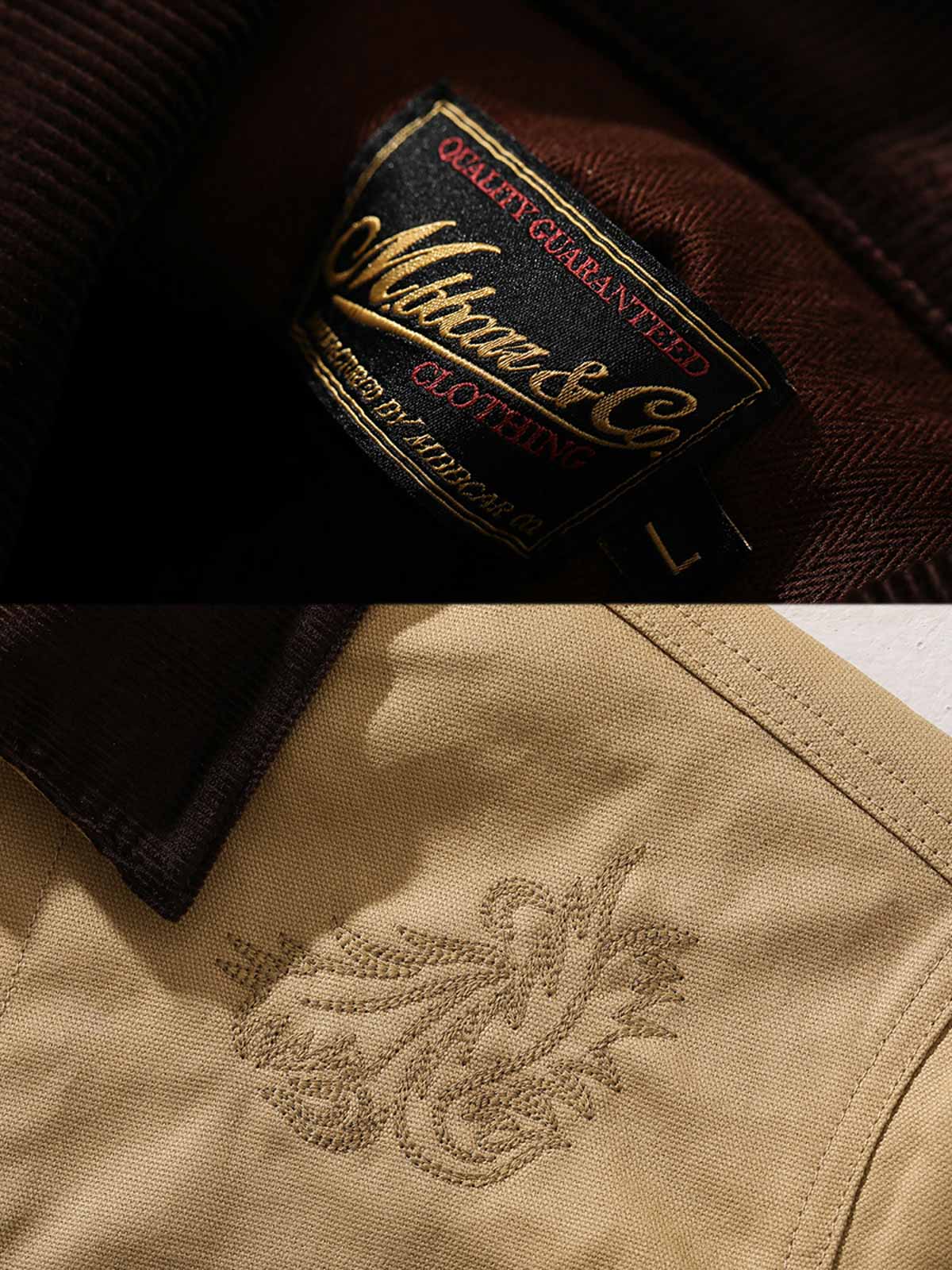 製品画像: オイルワックスジュファブリックのアメリカンビンテージライダースジャケット平置き画像 - 防風・保温デザイン
詳細画像: ヴィンテージ刺繍とコーデュロイ襟のディテール - レイヤー感とヴィンテージスタイル