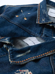 製品画像: ヴィンテージインディアンサンダーバード刺繍デニムジャケットの全体画像
詳細画像: インディアンサンダーバード刺繍ディテールとウォッシュ加工された立体的なカットの詳細画像