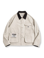 コーデュロイパッチワークミシガンワークジャケット全景、ジャケットの全体的なデザインとパッチワークの詳細を示す。