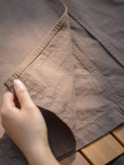 詳細画像:エプロンドレスのポケットと調節バックルの詳細