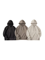 製品画像:カジュアルラグランスリーブフード付きスウェットシャツの正面図