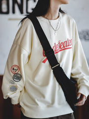 カレッジ風ラグランスリーブスウェットシャツ