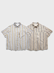 カラーブロックストライプが特徴の半袖シャツ、フロントのストライプポケットと襟元の洗練されたデザイン。