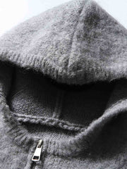 製品画像: ウール混紡フード付きニットカーディガンジャケットの正面画像
詳細画像: ニットのテクスチャーとジッパーのディテール