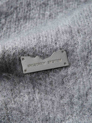 製品画像: ウール混紡フード付きニットカーディガンジャケットの正面画像
詳細画像: ニットのテクスチャーとジッパーのディテール