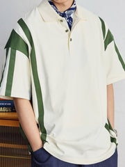 ポロシャツの草緑色ボタンと襟のディテールを特集し、洗練された作りを示す。